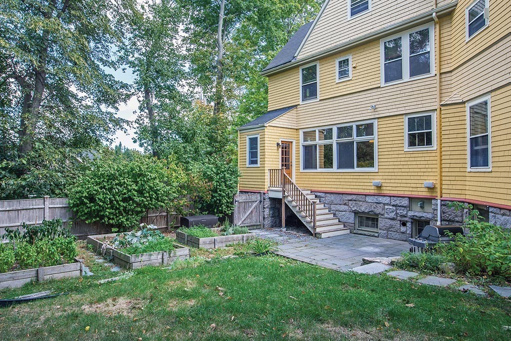 23 Philbrick Road Brookline, MA 02445 - Photo 10 of 10 a front view of a house with a yard