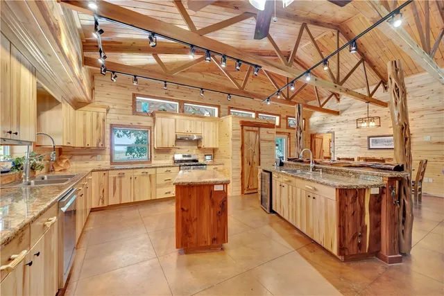 a bedroom with furniture and flat screen tv