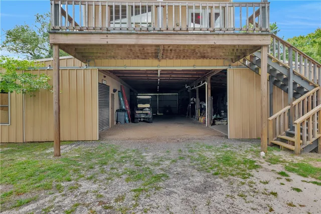 a room with lots of furniture and clutter