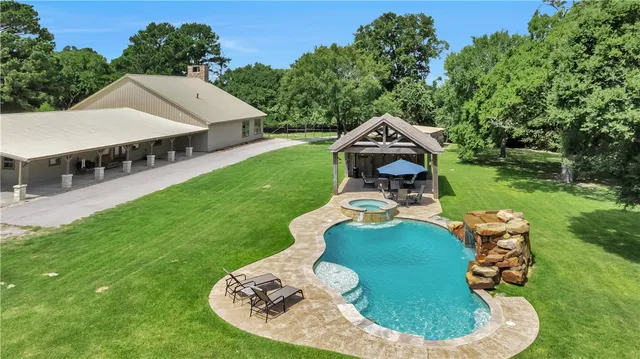 a table and chairs in the garden