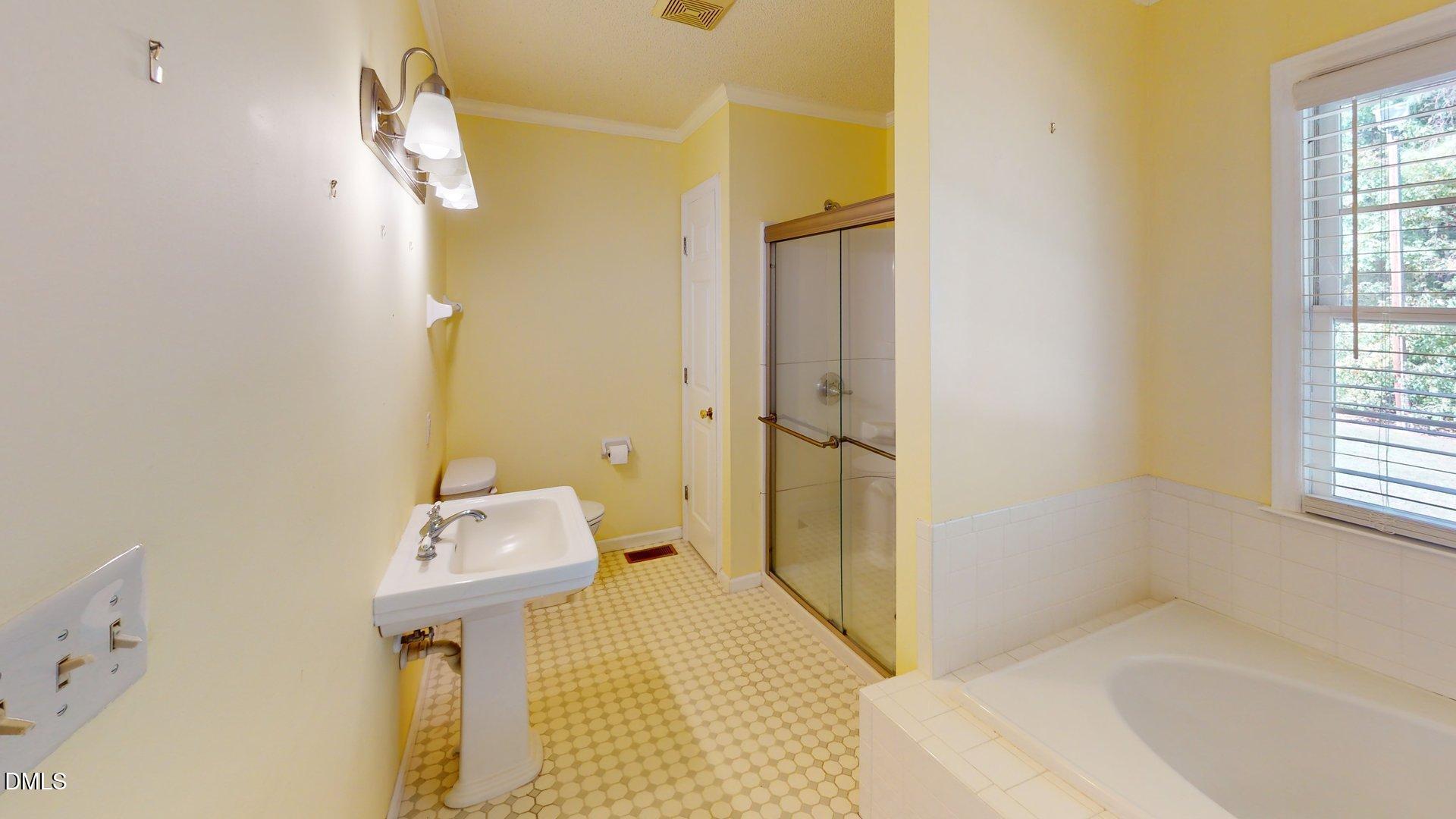 2805 Redwood Road Durham, NC 27704 - Photo 25 of 26 Primary Bath