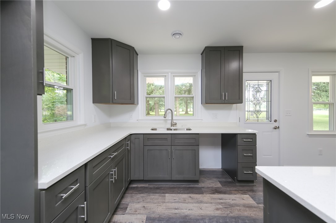 6544 Neff Road Valley City, OH 44280 - Photo 13 of 45 Kitchen with sink, dark hardwood / wood-style flooring, and a wealth of natural light