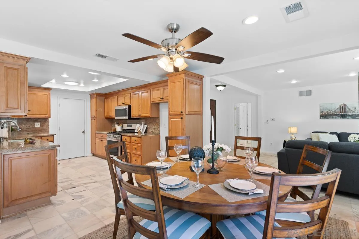 719 Mahogany Drive El Cajon, CA 92019 - Photo 11 of 30 a view of a dining room with furniture