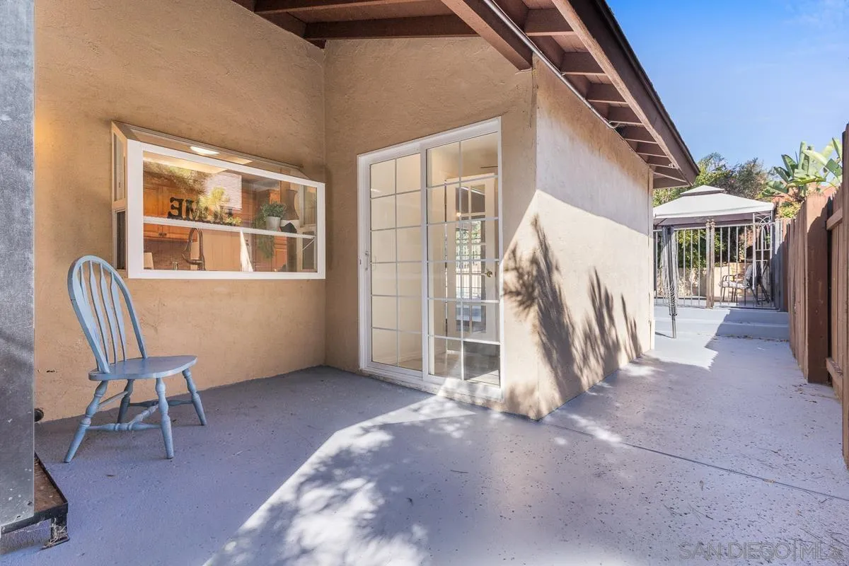 719 Mahogany Drive El Cajon, CA 92019 - Photo 28 of 30 a view of a livingroom with furniture and floor to ceiling window