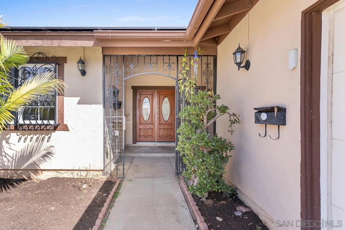 719 Mahogany Drive El Cajon, CA 92019 - Photo 5 of 30 a front view of a house with a garage