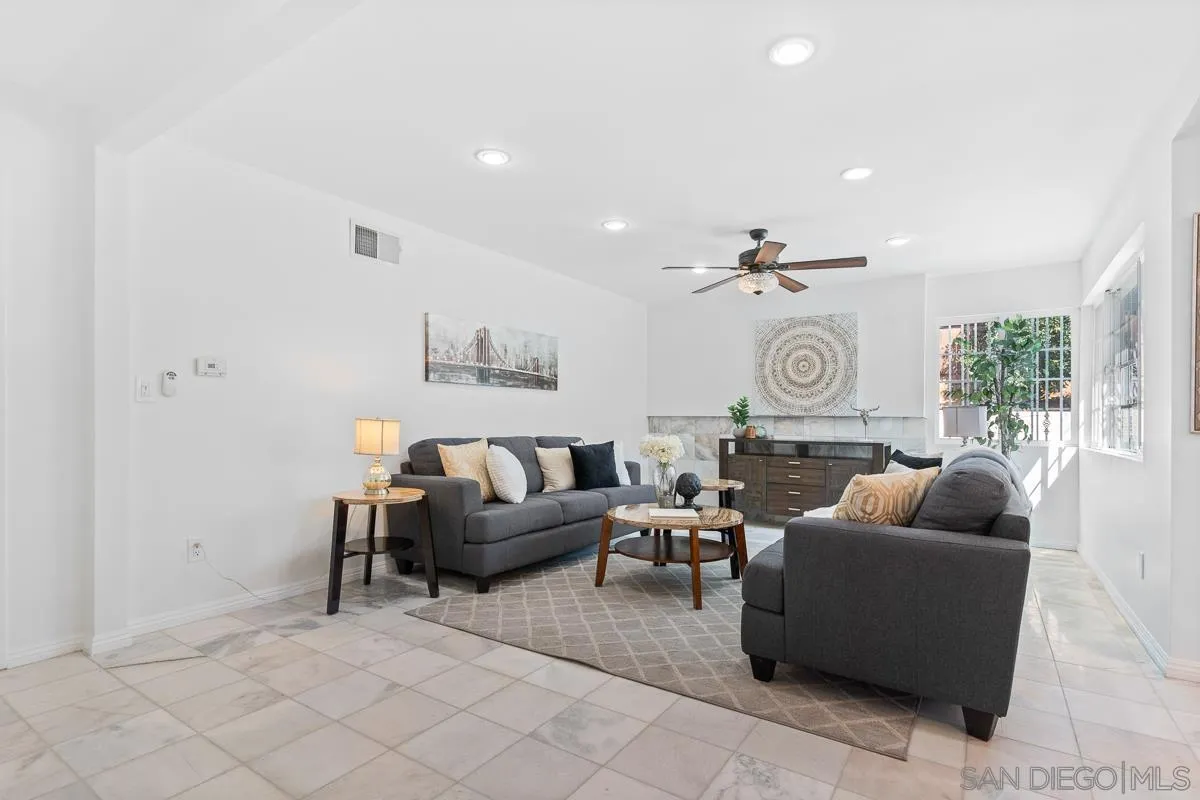 719 Mahogany Drive El Cajon, CA 92019 - Photo 6 of 30 a living room with furniture and a large window