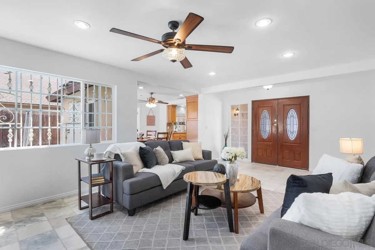 719 Mahogany Drive El Cajon, CA 92019 - Photo 8 of 30 a living room with furniture and a large window