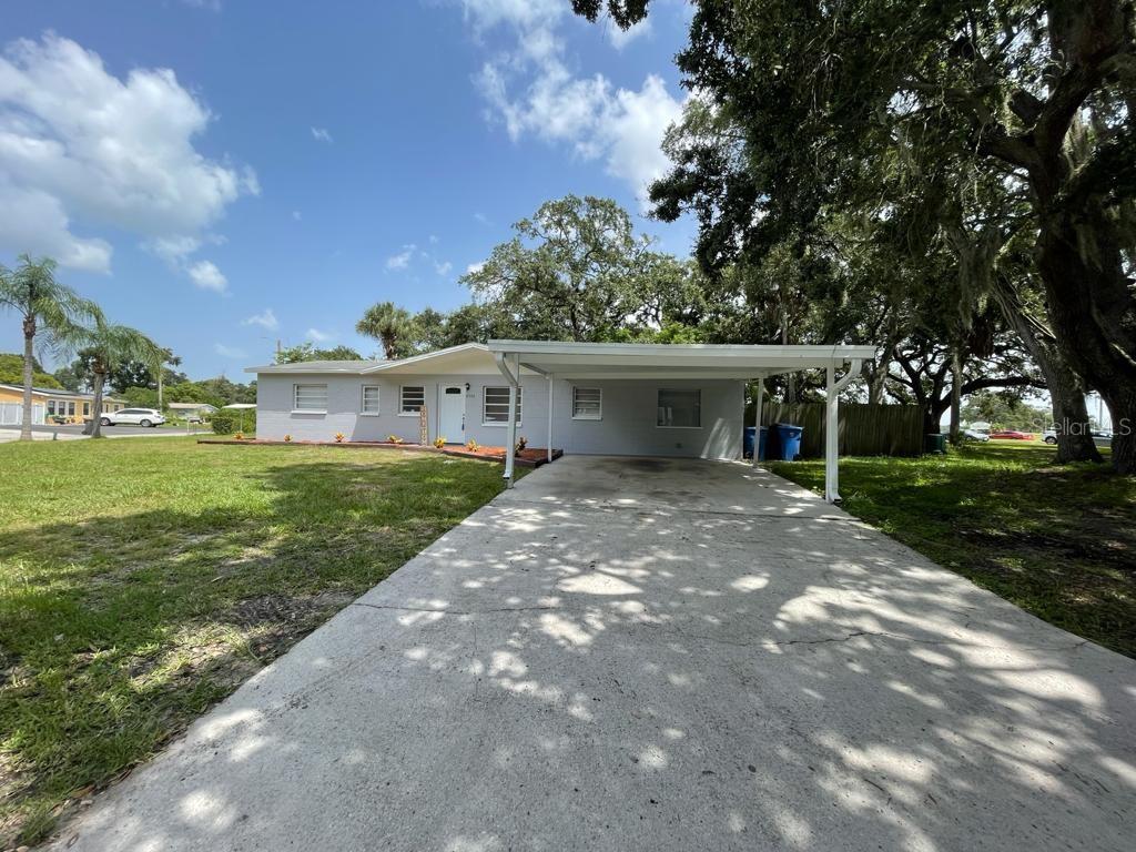4501 Hampshire Road Tampa, FL 33634 - Photo 1 of 1 a view of a house with a yard