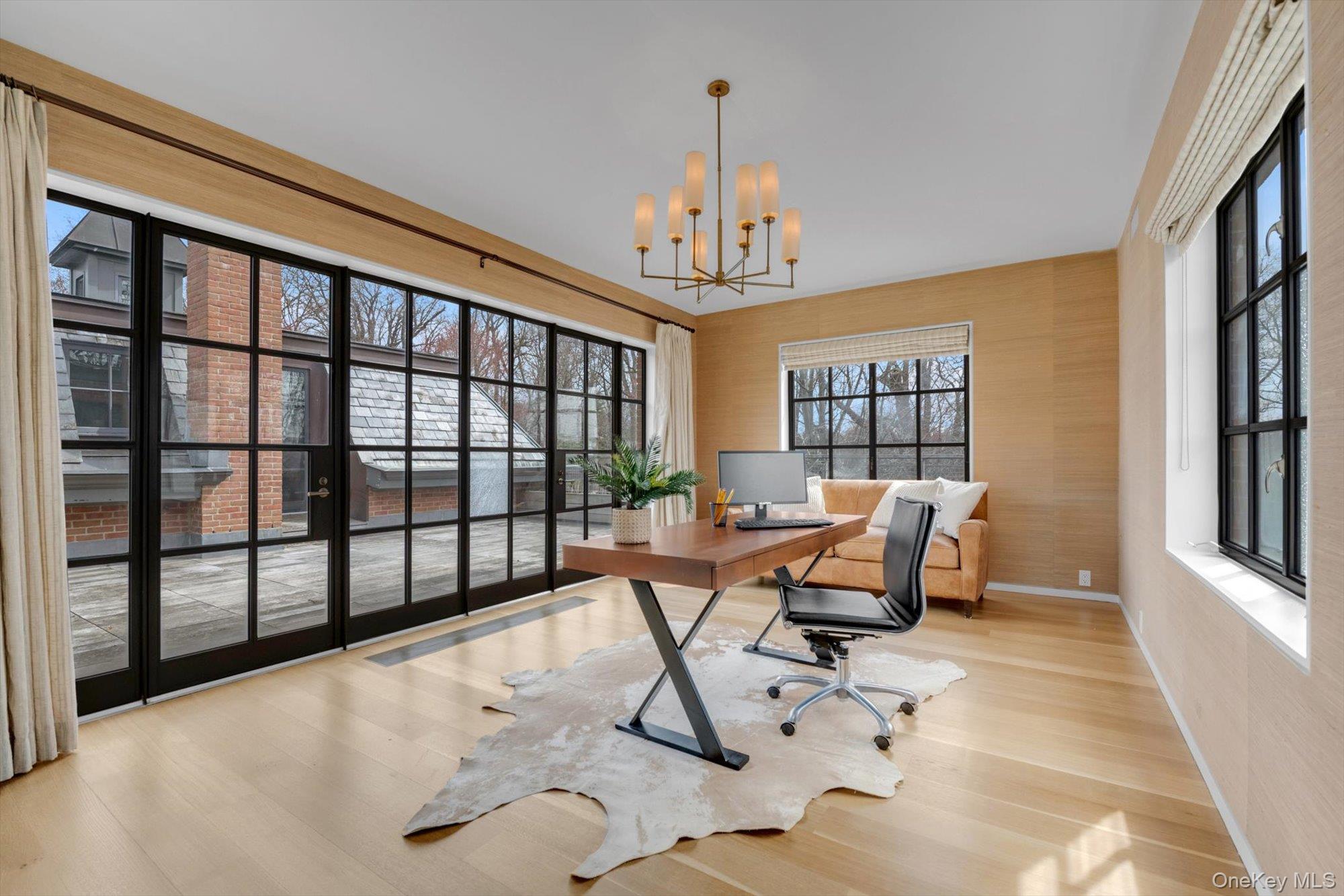 217 Sands Point Road Sands Point, NY 11050 - Photo 20 of 39 a view of a livingroom with furniture and a window
