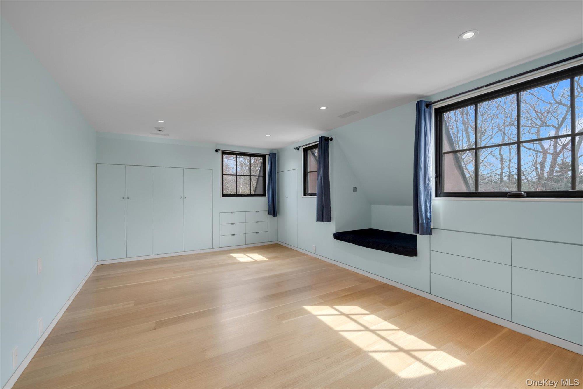 217 Sands Point Road Sands Point, NY 11050 - Photo 27 of 39 a view of an empty room with a window