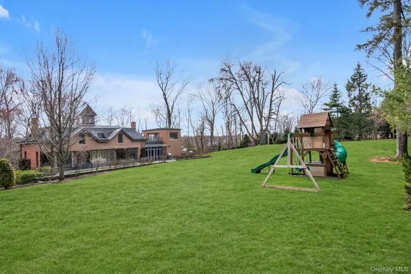 a view of a park with a slide