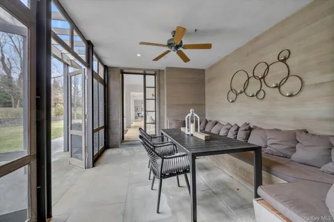 a view of a livingroom with furniture and window