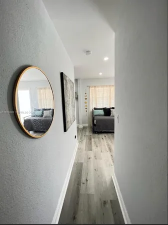wooden floor in a house with a window