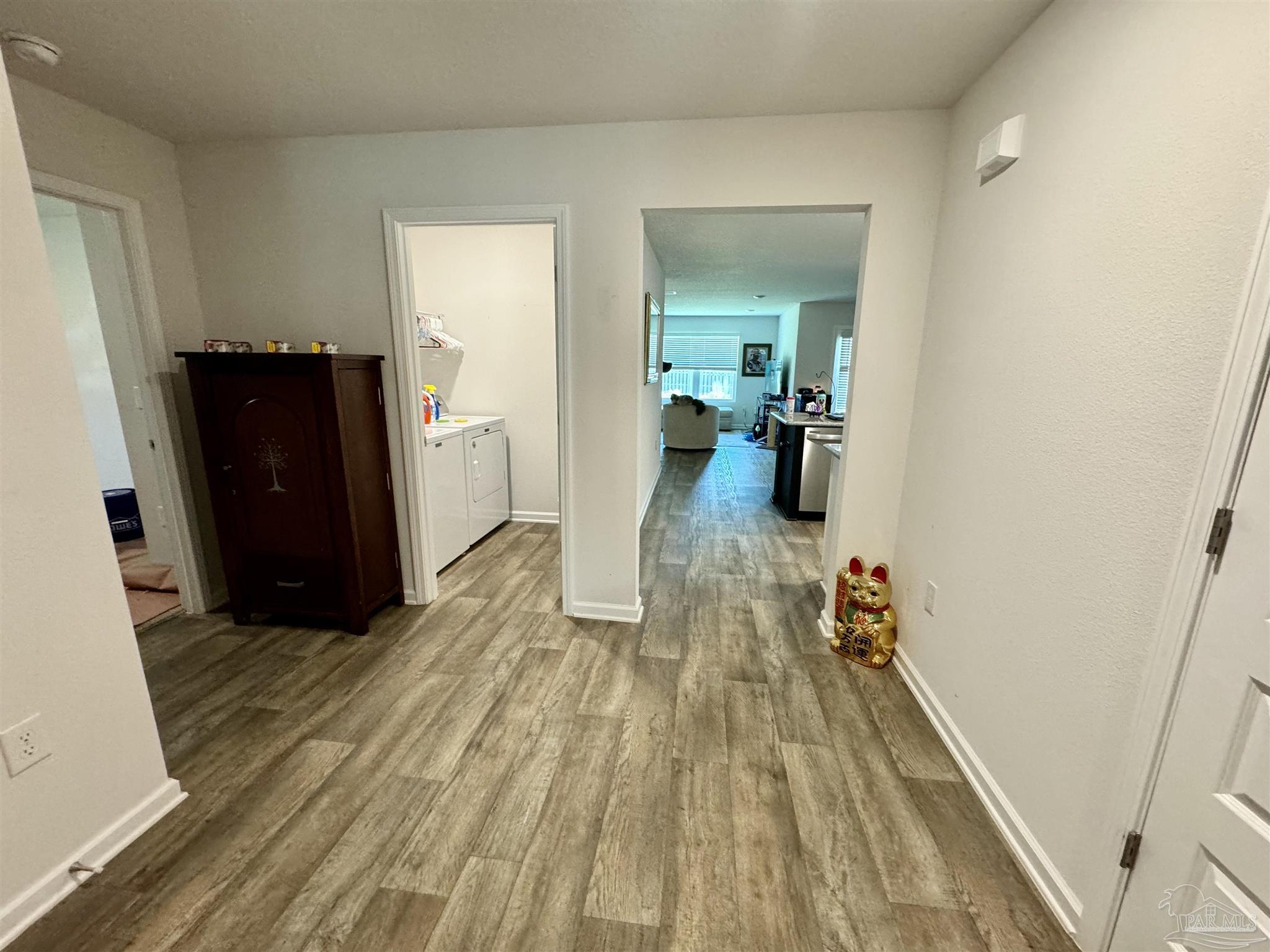 5645 Guinevere Lane Milton, FL 32583 - Photo 10 of 24 wooden floor in a gallery