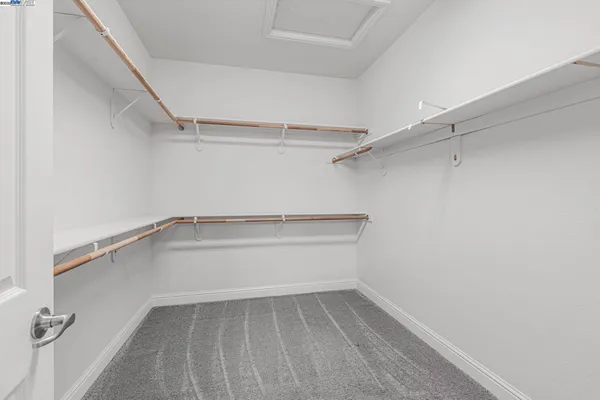 a view of an empty walk in closet