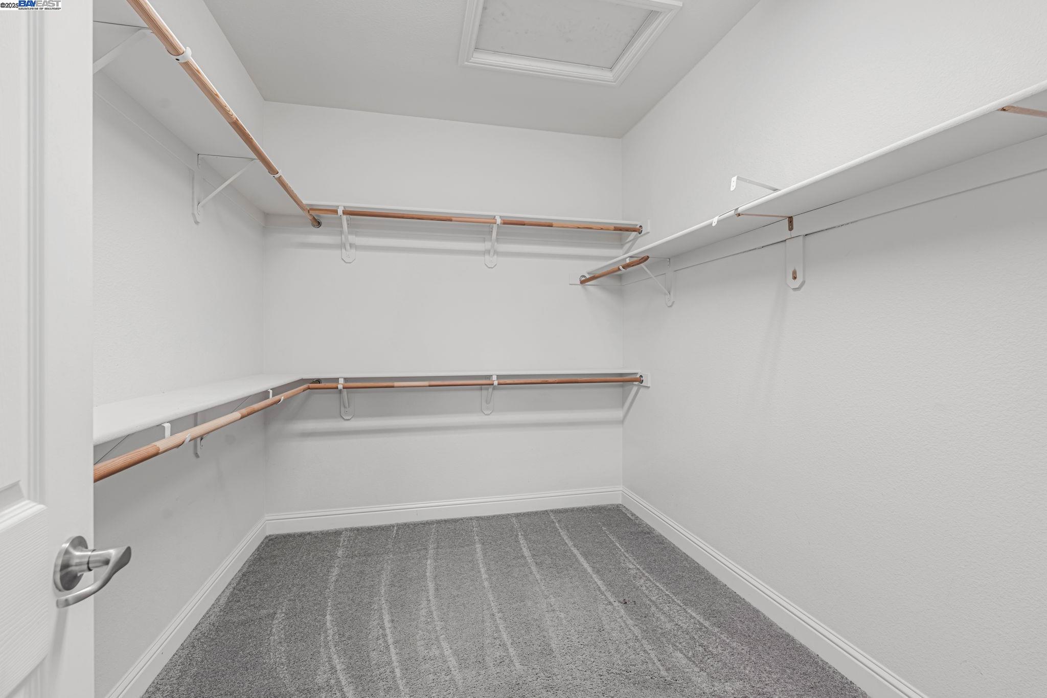 2491 Redbud Way Manteca, CA 95336 - Photo 14 of 27 a view of an empty walk in closet