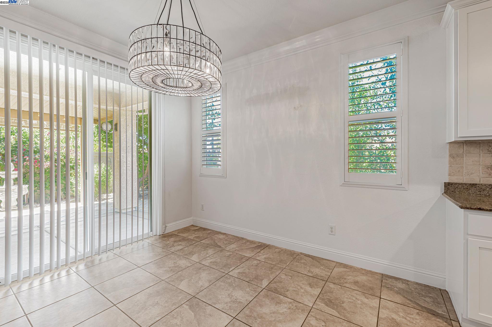 2491 Redbud Way Manteca, CA 95336 - Photo 9 of 27 a view of empty room with window