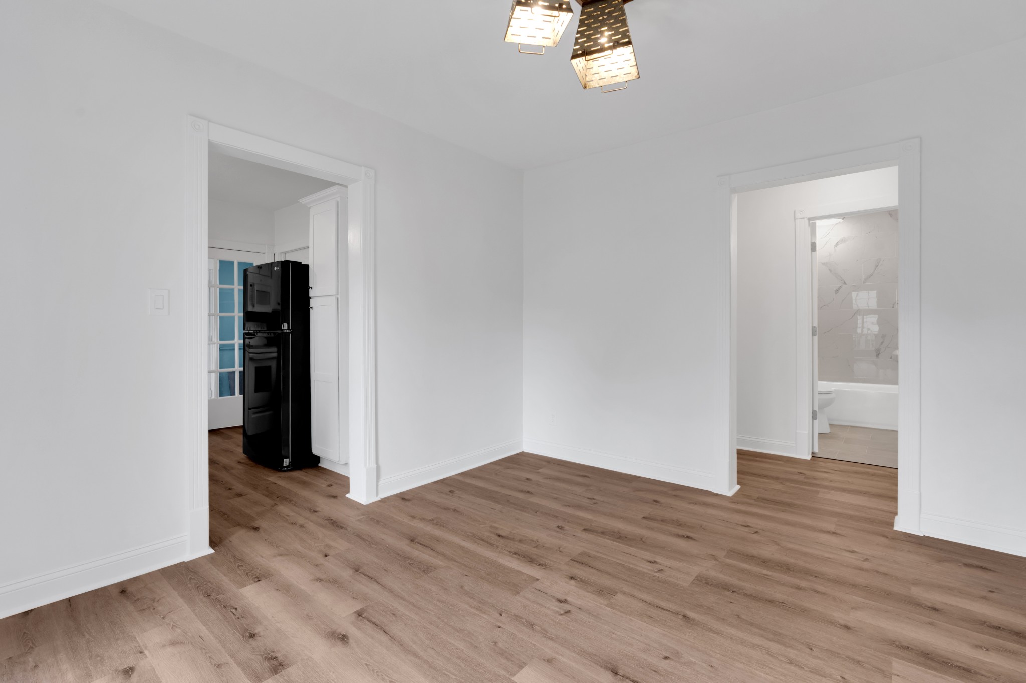 815 North High Street Winchester, TN 37398 - Photo 11 of 24 a view of an empty room with wooden floor and closet