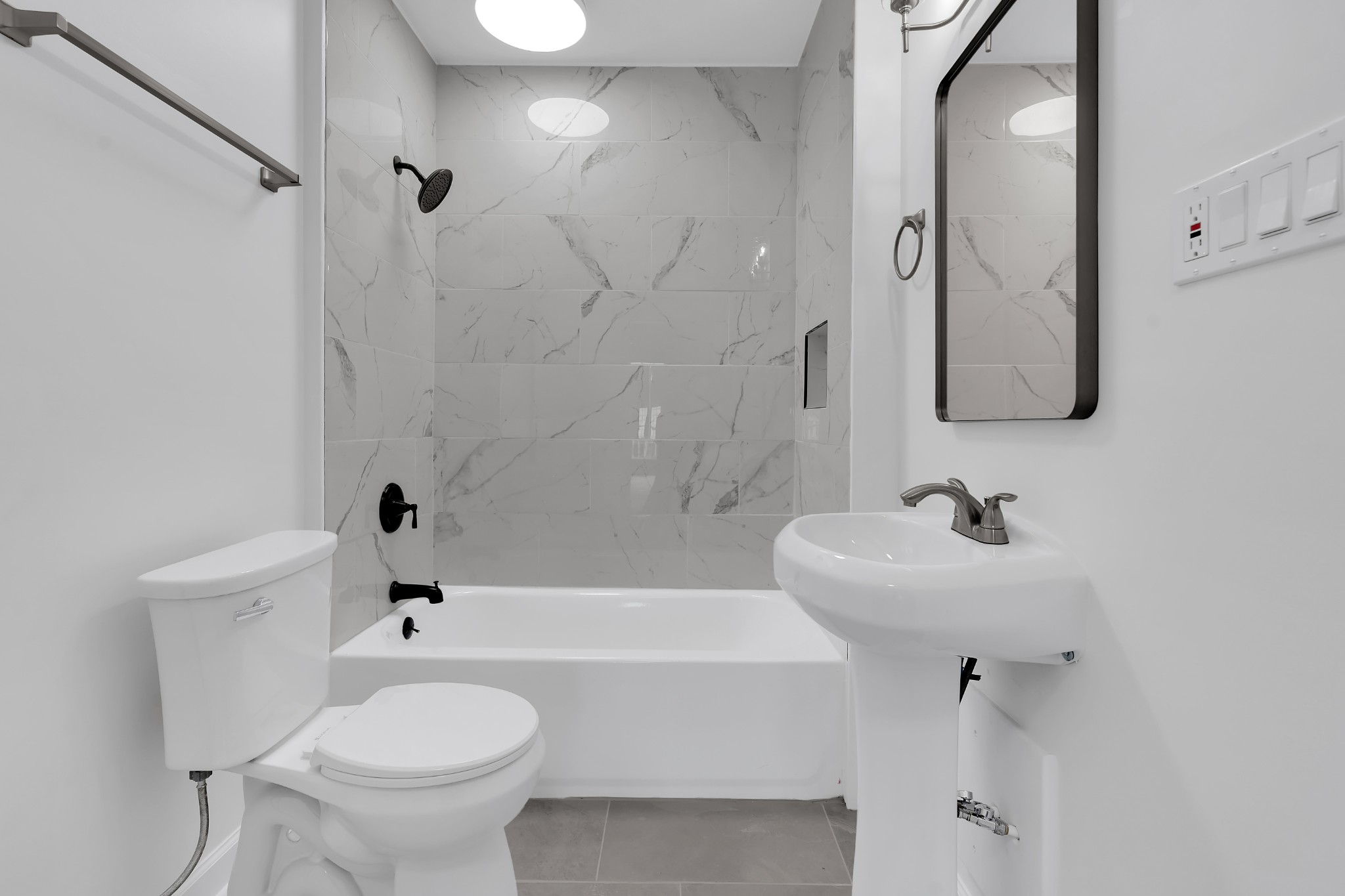 815 North High Street Winchester, TN 37398 - Photo 14 of 24 a bathroom with a sink toilet and shower