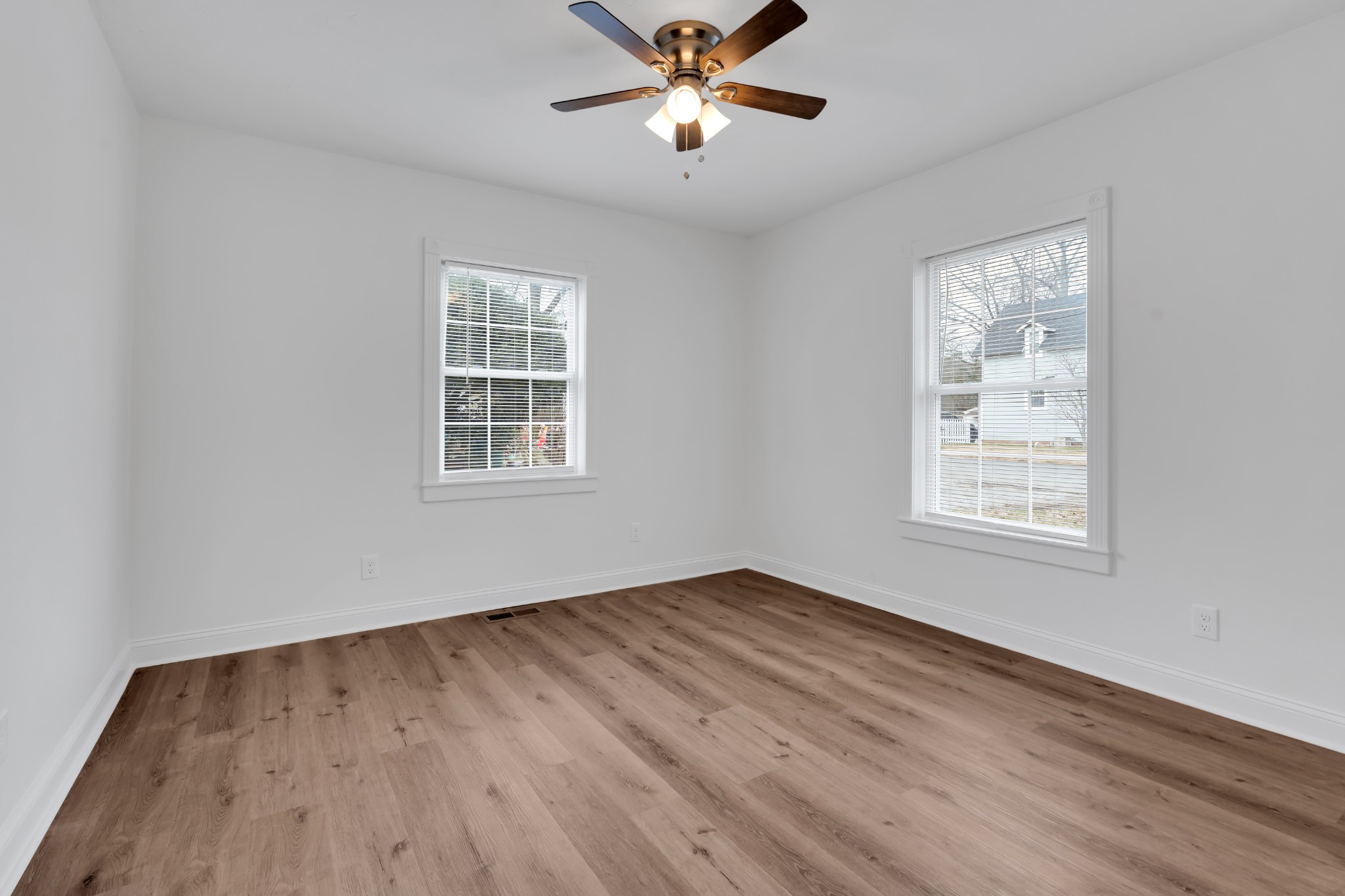 815 North High Street Winchester, TN 37398 - Photo 16 of 24 a view of empty room with wooden floor and fan
