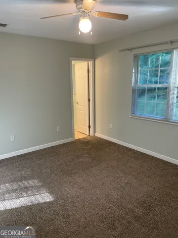 a view of walk in closet with empty space