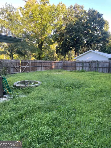 a view of a backyard with a garden