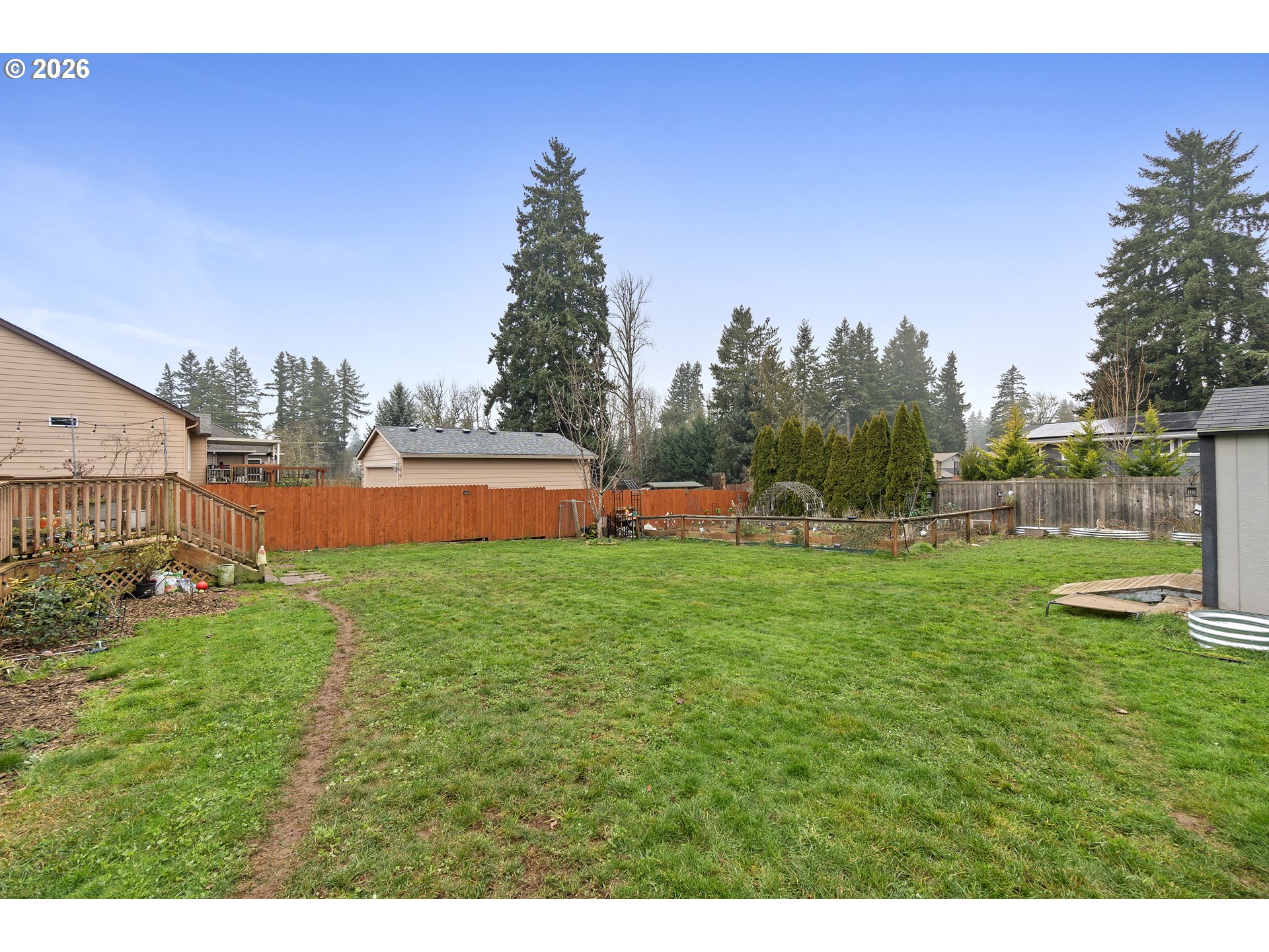 13177 Moccasin Way Oregon City, OR 97045 - Photo 32 of 44 a view of an house with backyard space and outdoor seating