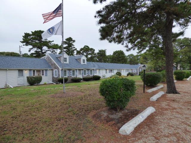 75 Beaten Road, Unit 9 Dennis Port, MA 02639 - Photo 14 of 14 a view of a house with a big yard plants and large tree