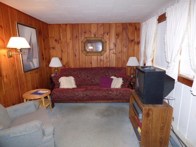 75 Beaten Road, Unit 9 Dennis Port, MA 02639 - Photo 3 of 14 a living room with furniture and a window