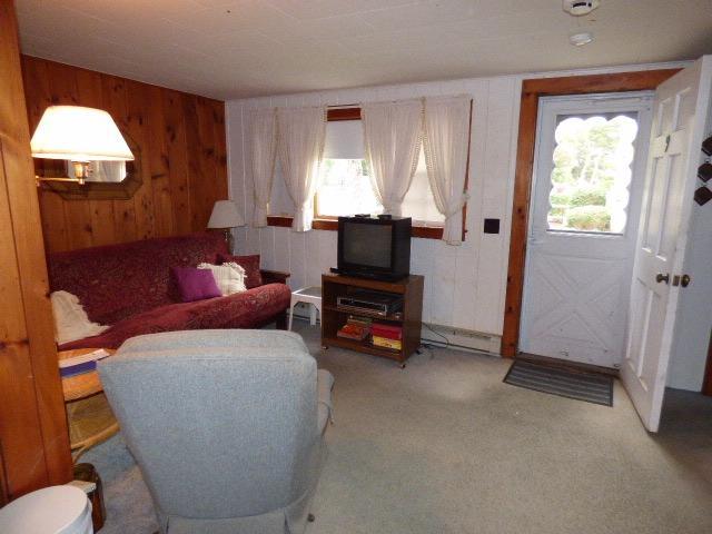 75 Beaten Road, Unit 9 Dennis Port, MA 02639 - Photo 6 of 14 a living room with furniture and a window