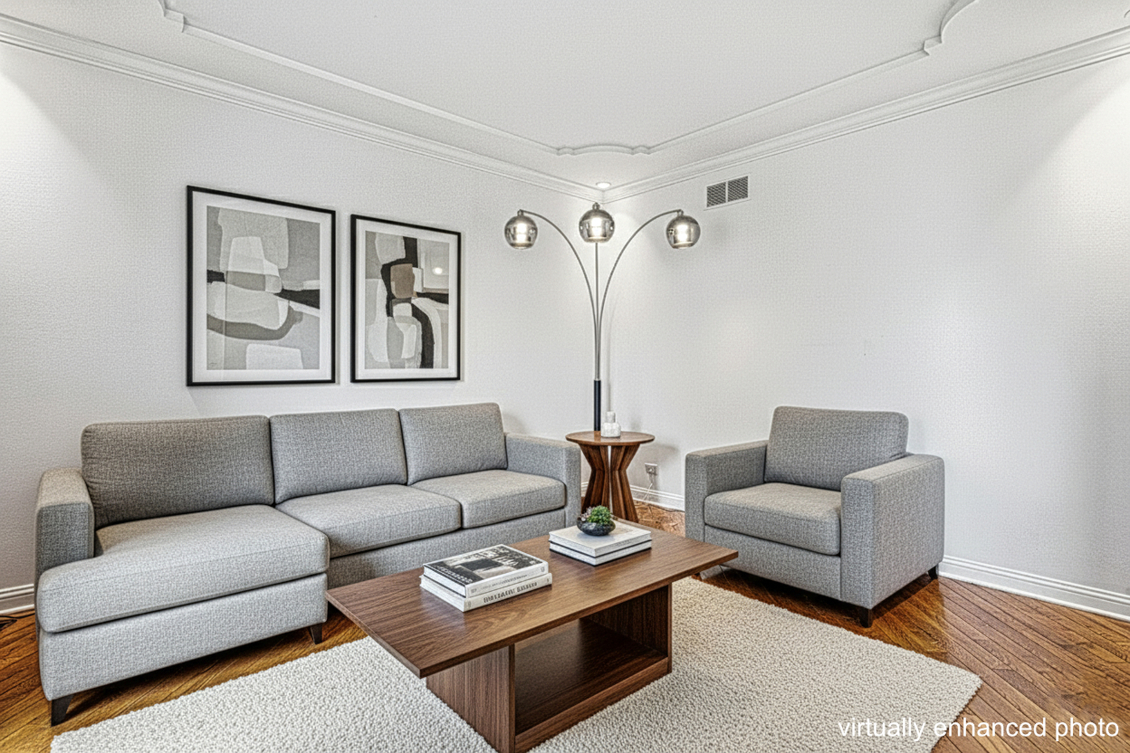 220 Santos Avenue Minooka, IL 60447 - Photo 2 of 46 a living room with furniture a couch and paintings on the wall