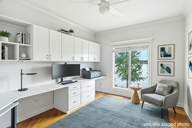 a kitchen with a sink cabinets and window