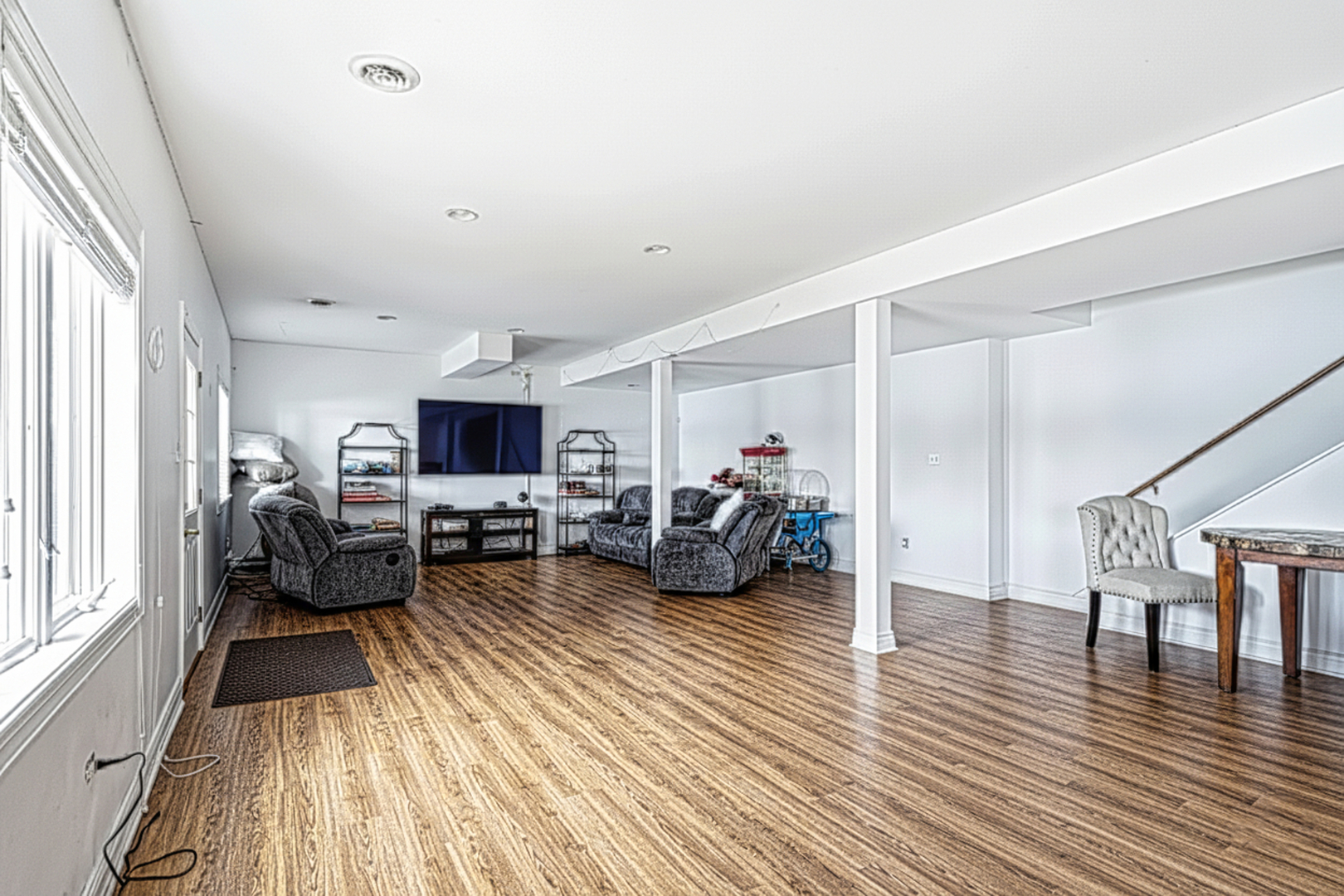 220 Santos Avenue Minooka, IL 60447 - Photo 29 of 46 a living room with furniture and a flat screen tv