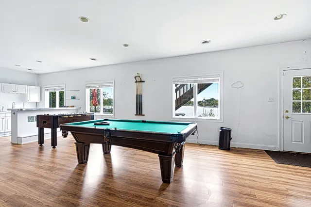 a room with furniture and wooden floor