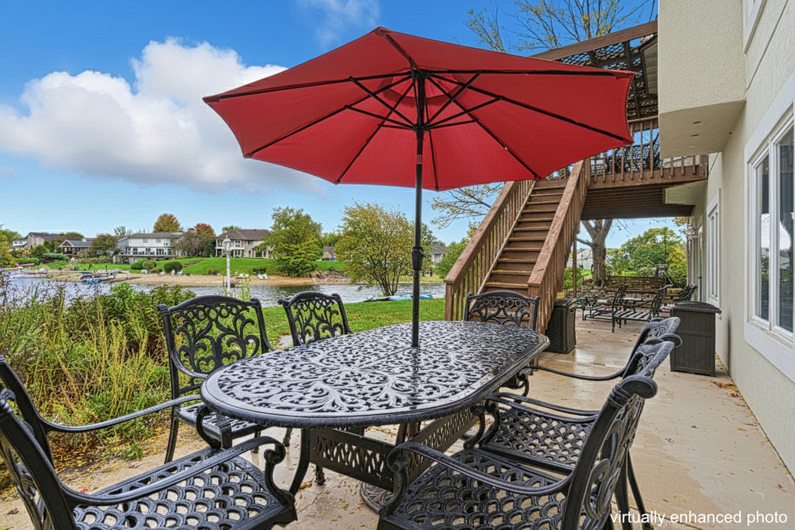 220 Santos Avenue Minooka, IL 60447 - Photo 39 of 46 a view of a balcony with a table and chairs
