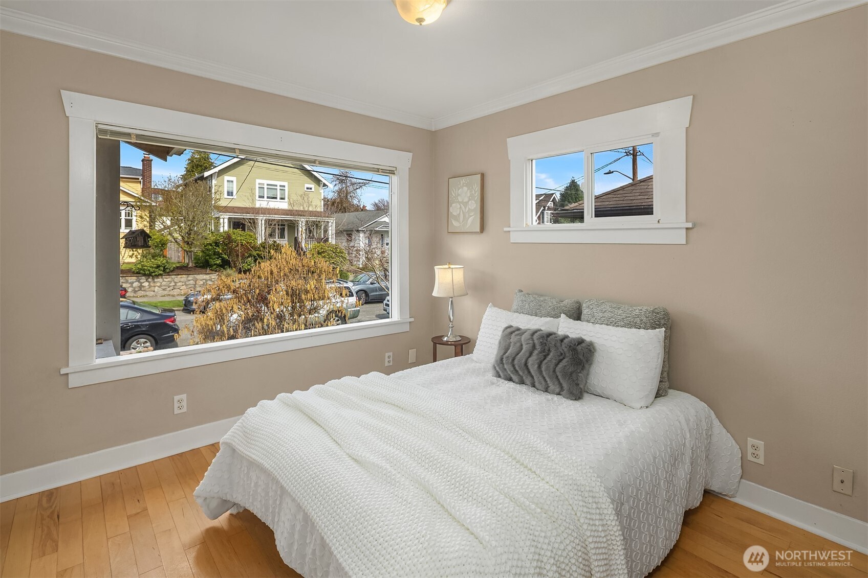 1341 North 78th Street Seattle, WA 98103 - Photo 11 of 23 a bedroom with a bed and a painting on the wall