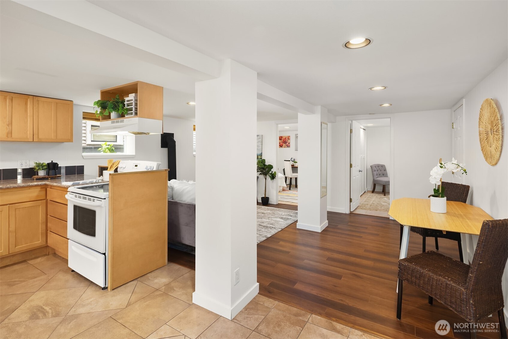 1341 North 78th Street Seattle, WA 98103 - Photo 15 of 23 a view of kitchen with cabinets and wooden floor