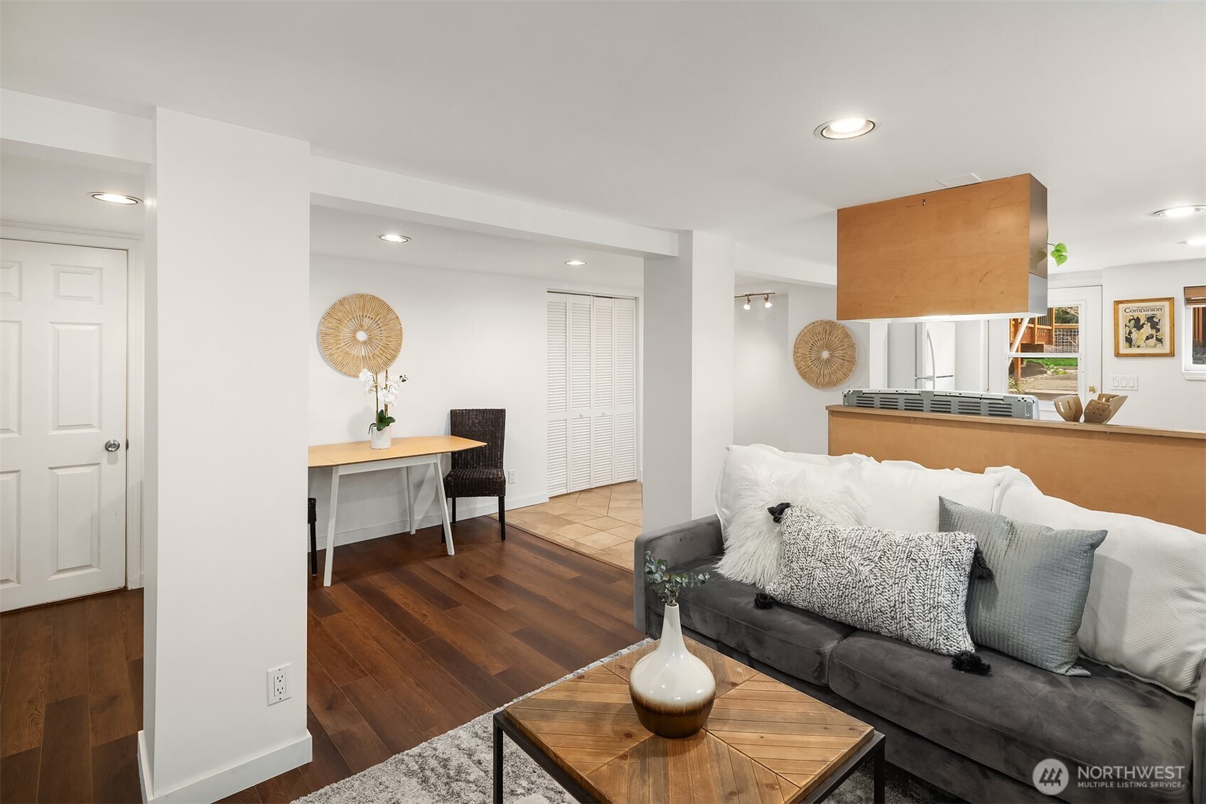 1341 North 78th Street Seattle, WA 98103 - Photo 20 of 23 a living room with furniture and wooden floor