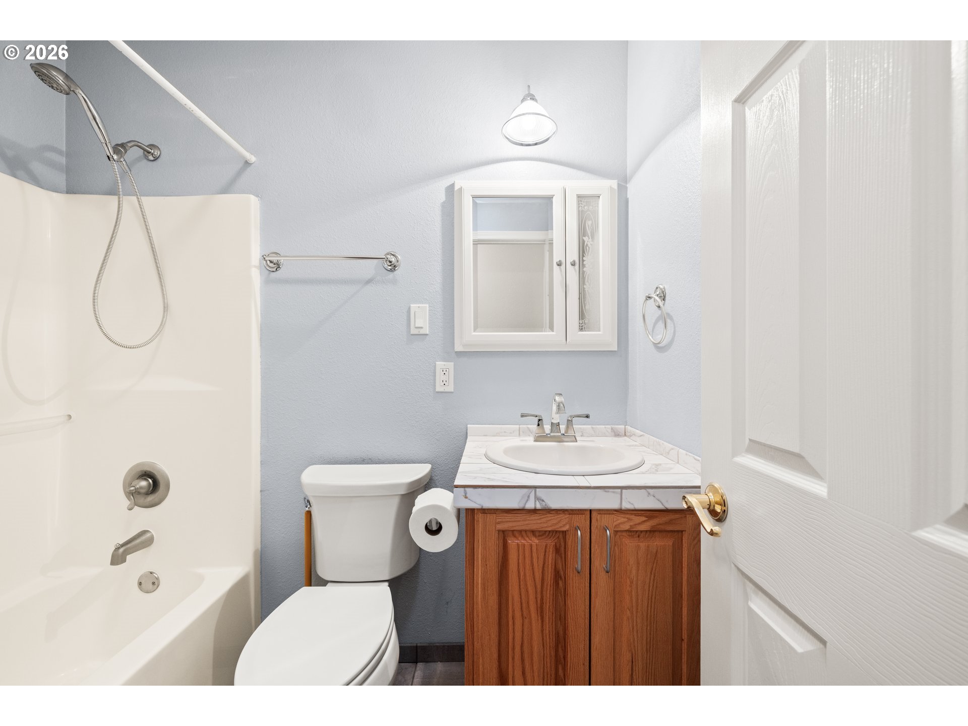 5720 Sollie Smith Road North Tillamook, OR 97141 - Photo 18 of 44 a bathroom with a sink toilet and shower