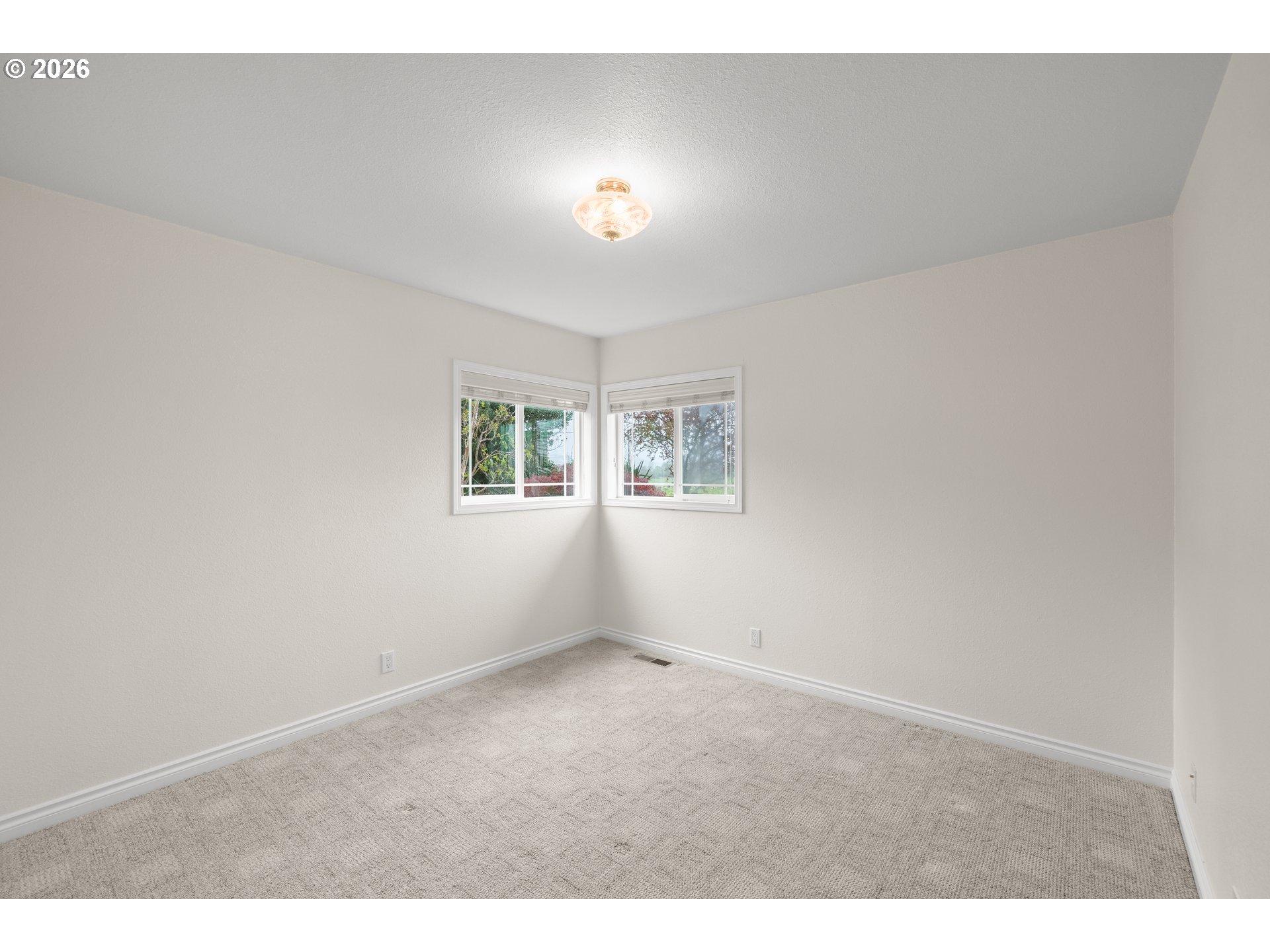5720 Sollie Smith Road North Tillamook, OR 97141 - Photo 22 of 44 a view of an empty room with a window