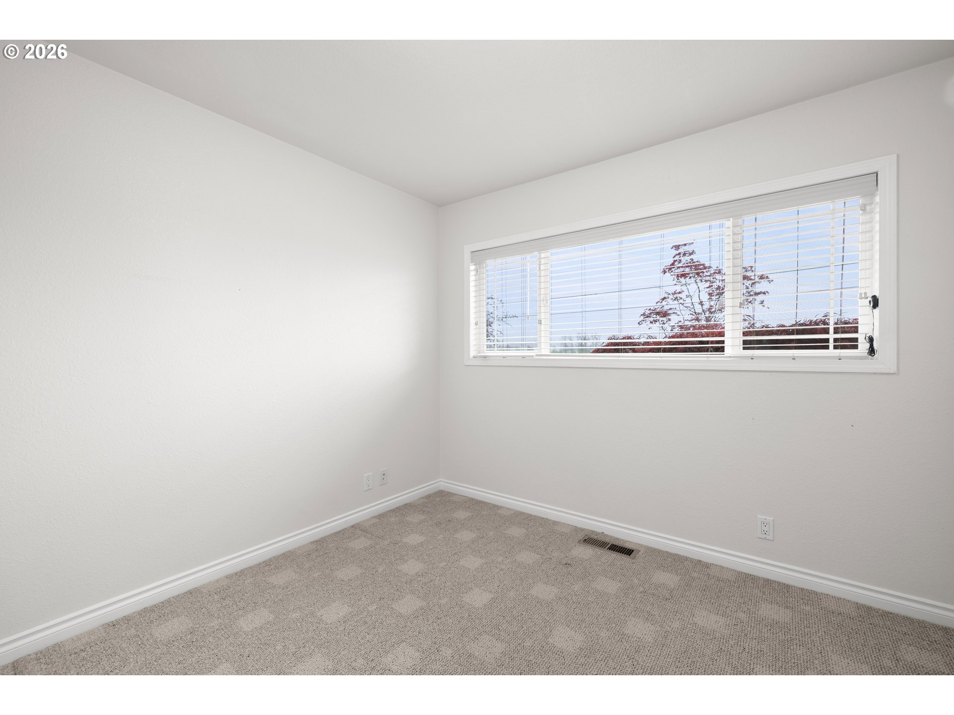 5720 Sollie Smith Road North Tillamook, OR 97141 - Photo 30 of 44 an empty room with wall paintings and windows