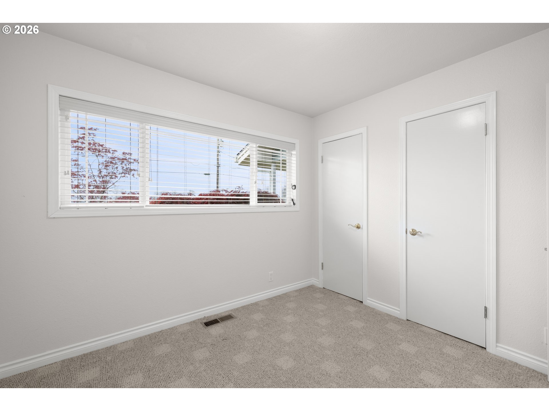 5720 Sollie Smith Road North Tillamook, OR 97141 - Photo 31 of 44 a room with a white wall and a window