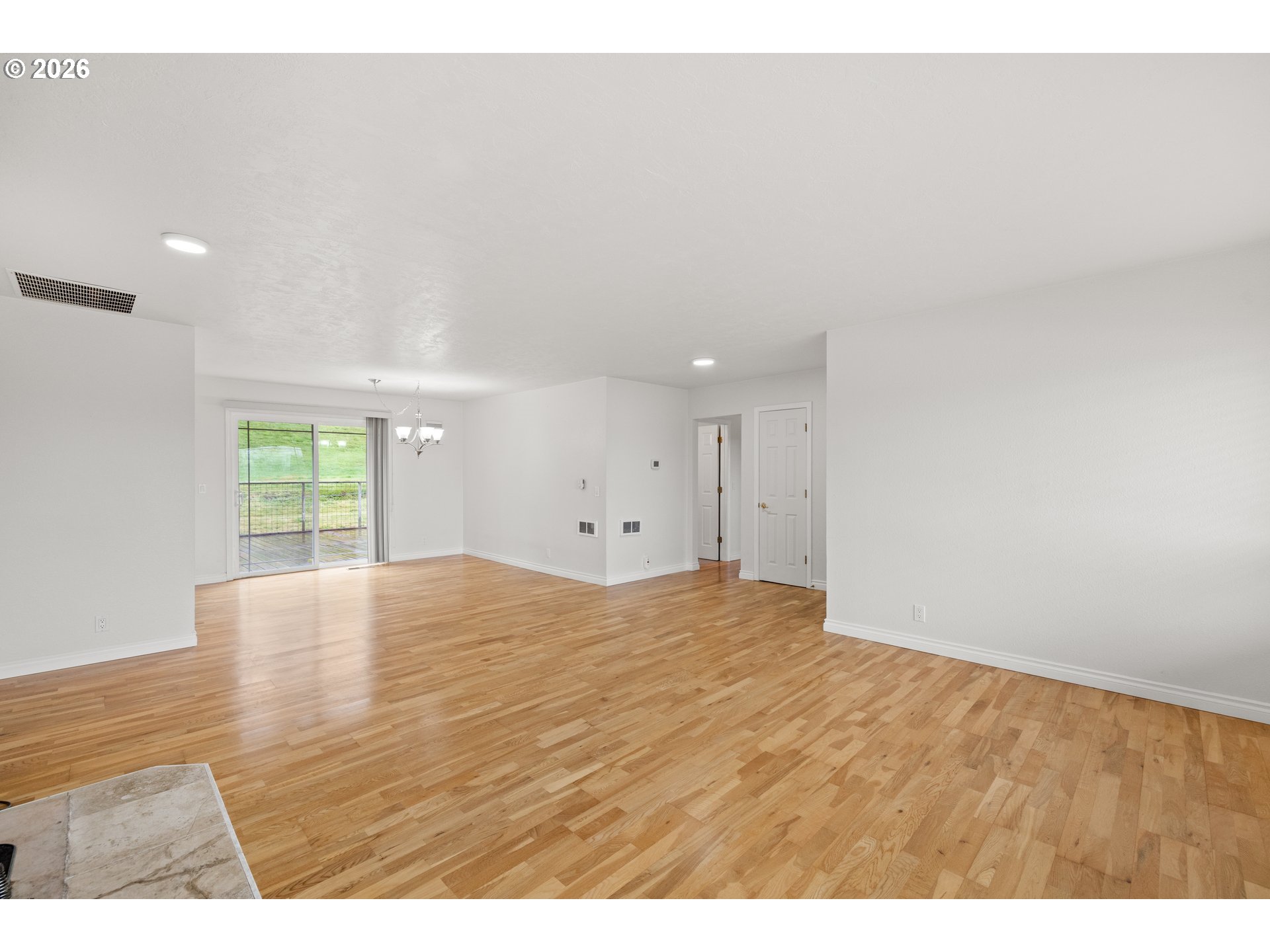 5720 Sollie Smith Road North Tillamook, OR 97141 - Photo 8 of 44 a view of empty room with wooden floor