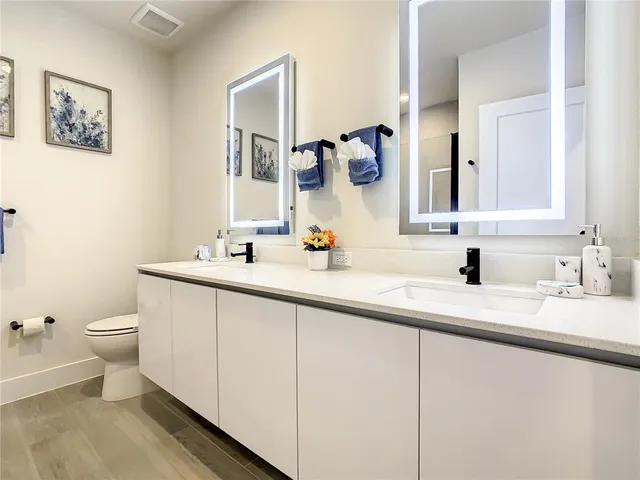 a view of a livingroom with an empty space and a flat screen tv