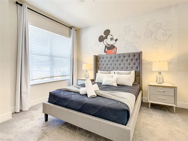 a view of a patio with a dining table and chairs