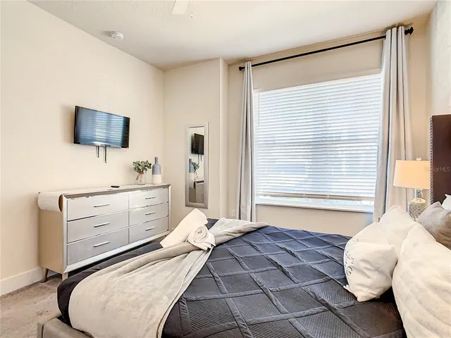 an aerial view of a house with a swimming pool