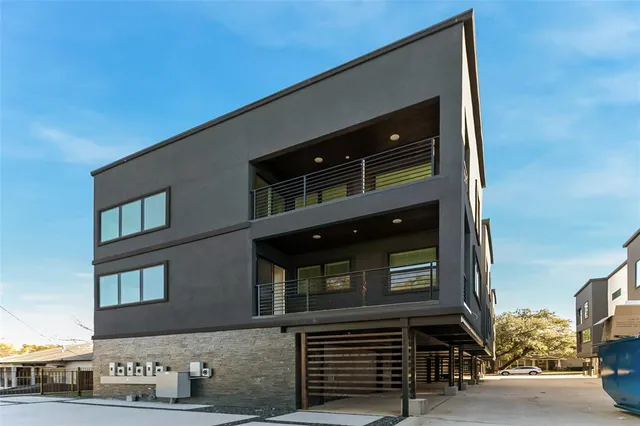 a front view of a house with parking