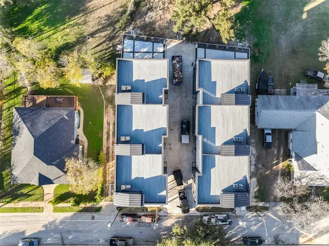 a backyard of a house with outdoor seating