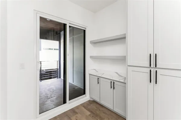a view of a bathroom from a hallway