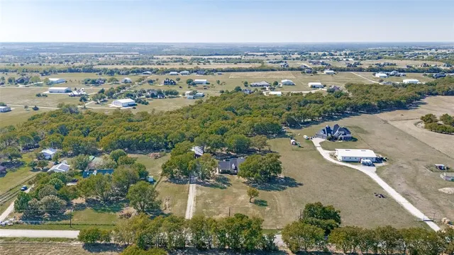an aerial view of a city with lots of residential buildings